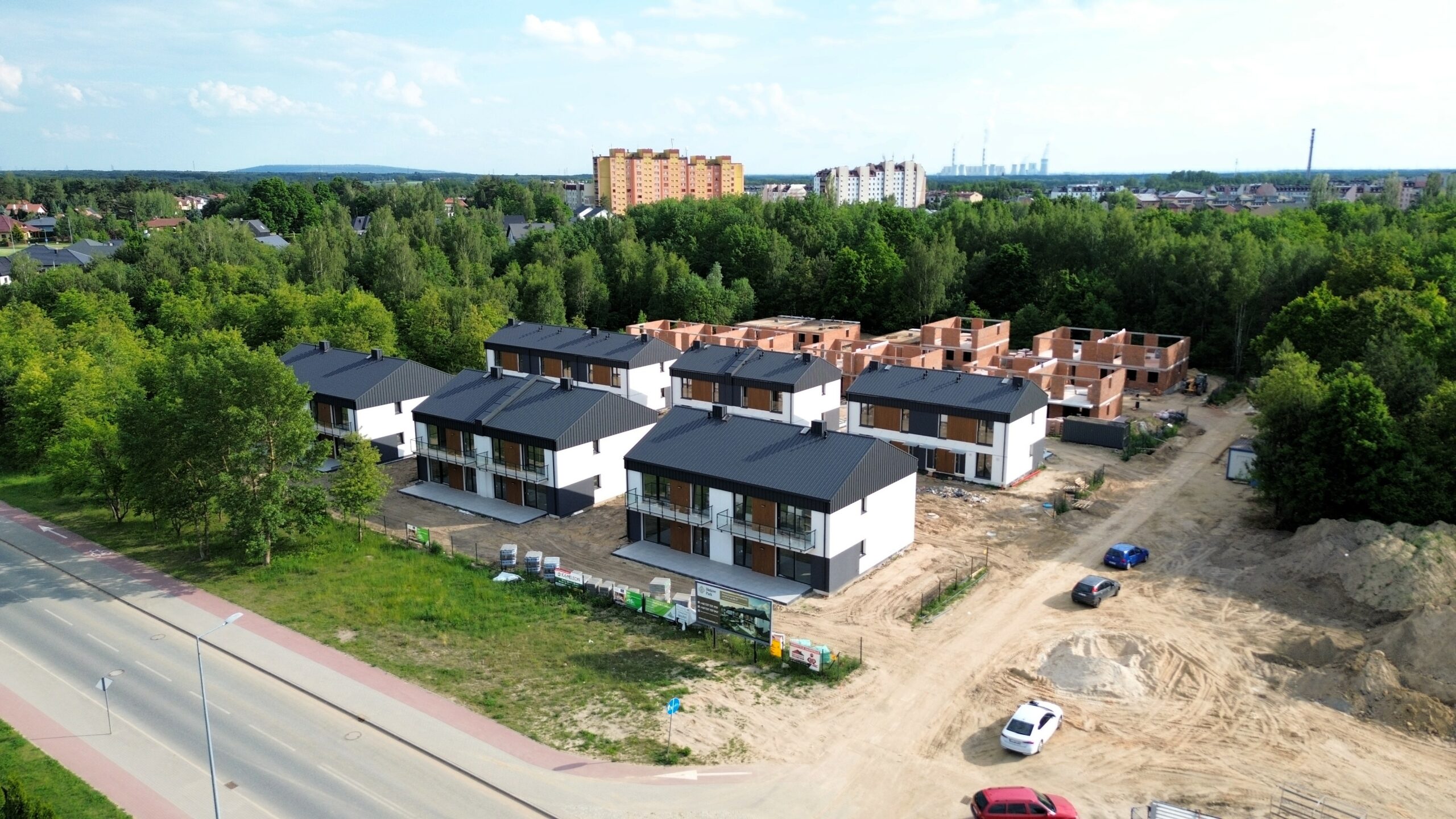 Apartament V1 - Binków park Osiedle mieszkaniowe w Bełchatowie z elektrownią w tle